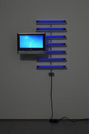 Electric Life Drawing
2009
Fluorescent light fixtures, black light bulbs, flat screen TV/DVD player, 
DVD, electrical hardware
39 x 44 x 9 1/2 in
Unique