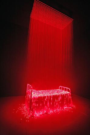 Reincarnation, 2007
Laser lights, bed frame, fabric, fog machine
88 1/2 x 44 inches, height variable
SGI2764