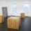 Installation view: Three new buildings, a fence and a factory.