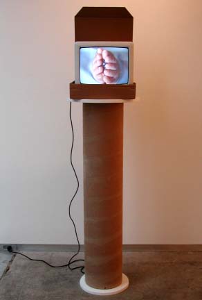 Joan Petit II (The Artist Devouring his Son in a Pizza Style)
2002
Television, dvd, dvd player, cardboard, wood
72 x 15 x 17 inches