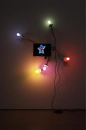 MATTHEW McCASLIN
Happy Daze
2009
Conduit, electrical hardware, 5 porcelain sockets, 5 colored light bulbs, 5 blinkers, 15" TV/DVD player, DVD, TV wall mount
48 x 60 x 8 inches