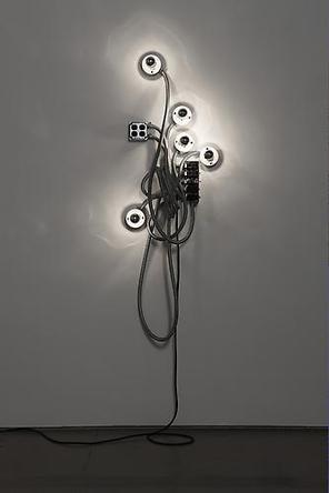 She or He
2009
Flexible electrical conduit, porcelain light sockets, 
mirrored light bulbs, electrical hardware
66 x 24 x 13 in
Unique