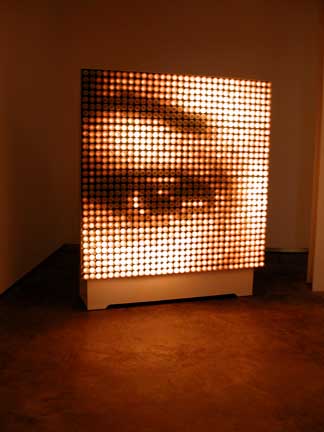 L'Oeil (The Eye) 
2001
Light bulbs, aluminum, electronic device and electrical hardware
74 ½ x 59 x 20 inches
Unique