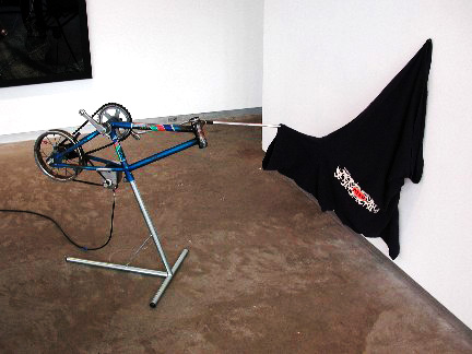 Mini Bike 
2005
Bicycle parts, mechanical parts, transformer, motion sensor, shirt
40 x 16 x 65 inches
Unique