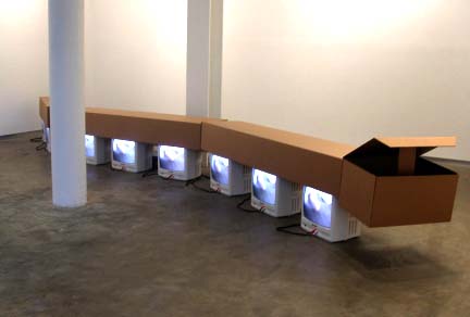 Almost Worm II
2002
Cardboard, televisions, dvd, dvd player
21 x 222 x 16 inches
