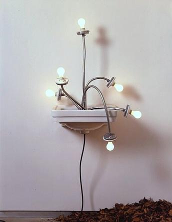 Wall Arrangement
2005
Porcelain sink, conduit, porcelain lamps, electrical materials, light bulbs, soil
72 x 32 x 20 inches